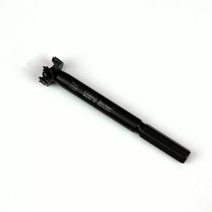 Woodworking Forstner drill bit with hex shank on white background