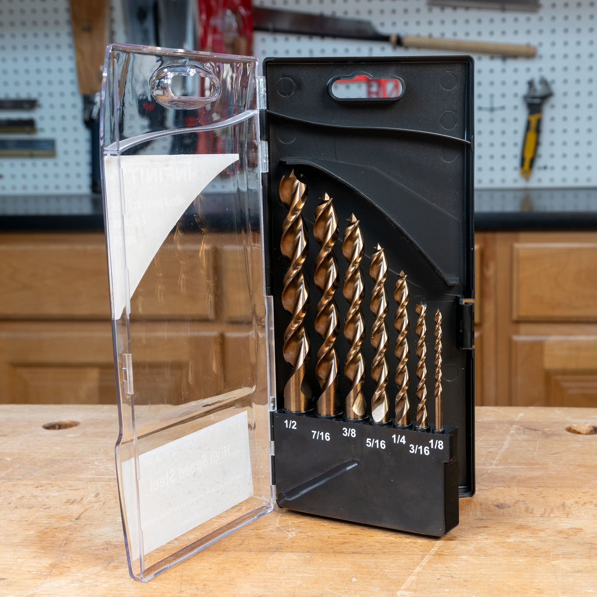 Imperial high speed steel drill bit set in black plastic case on woodworking bench