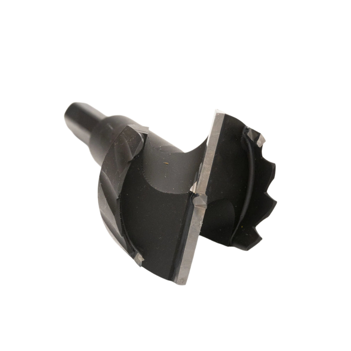 Carbide-tipped Forstner bit for woodworking, sharp edge, clean cutting surface visible
