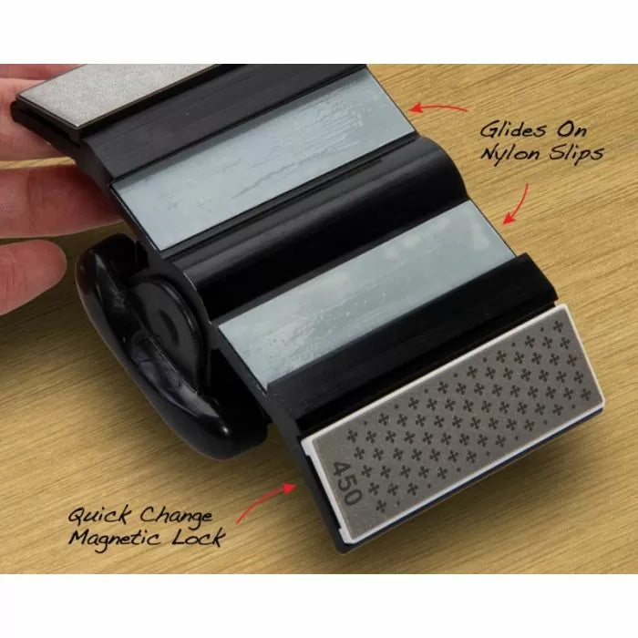 Woodworking tool sharpening carriage with diamond abrasive pad, quick change magnetic lock, and glides on nylon slips.
