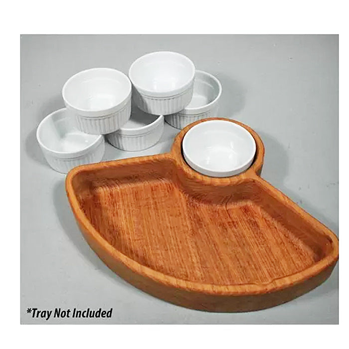Set of six white ceramic ramekins displayed beside a wooden serving tray, tray not included