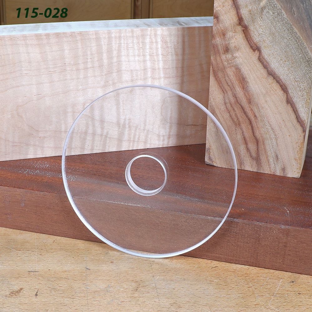 Clear acrylic circle woodworking template on wood boards, ideal for routing projects