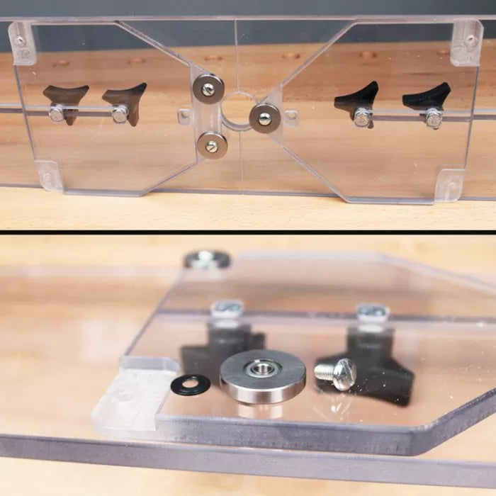 Clear acrylic router table jig with guide bearings and adjustment knobs on a workbench