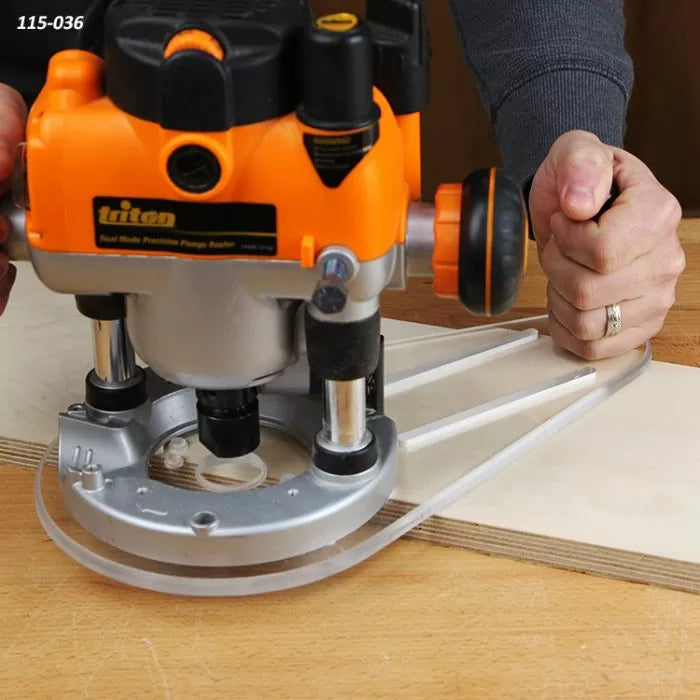 Plunge router with edge guide cutting a precise circle in plywood on a workbench