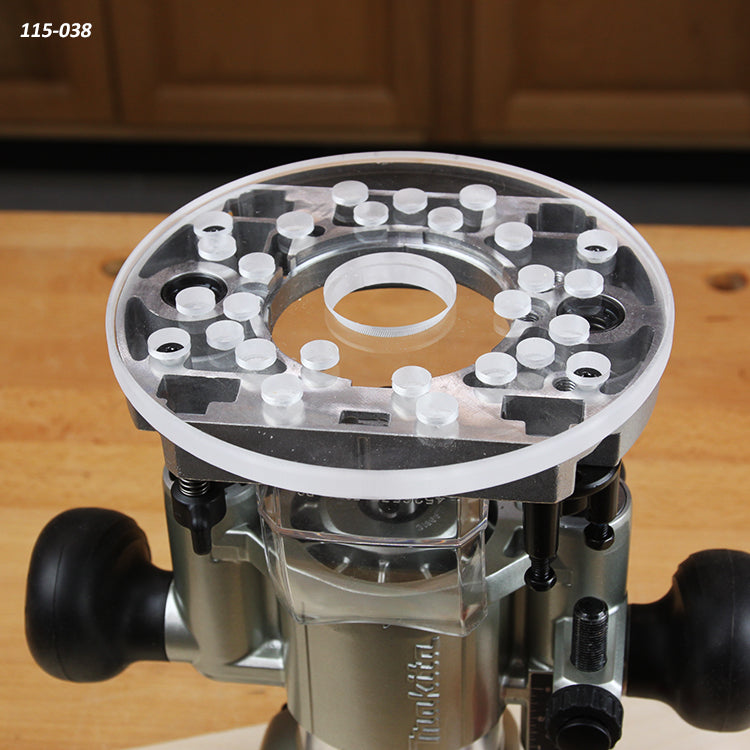 Clear acrylic router baseplate with multiple holes mounted on a woodworking router