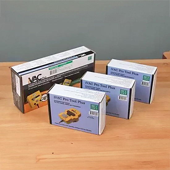 iVAC Pro Tool Plus woodworking tool accessory boxes on a wooden workbench