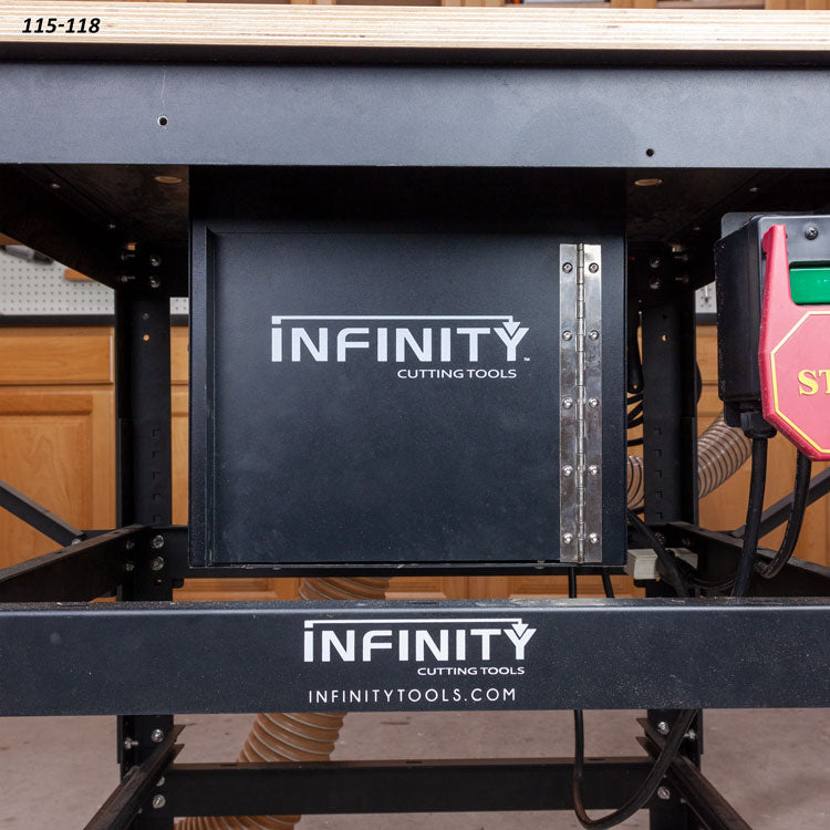 Dust collection box installed under a woodworking router table in a workshop