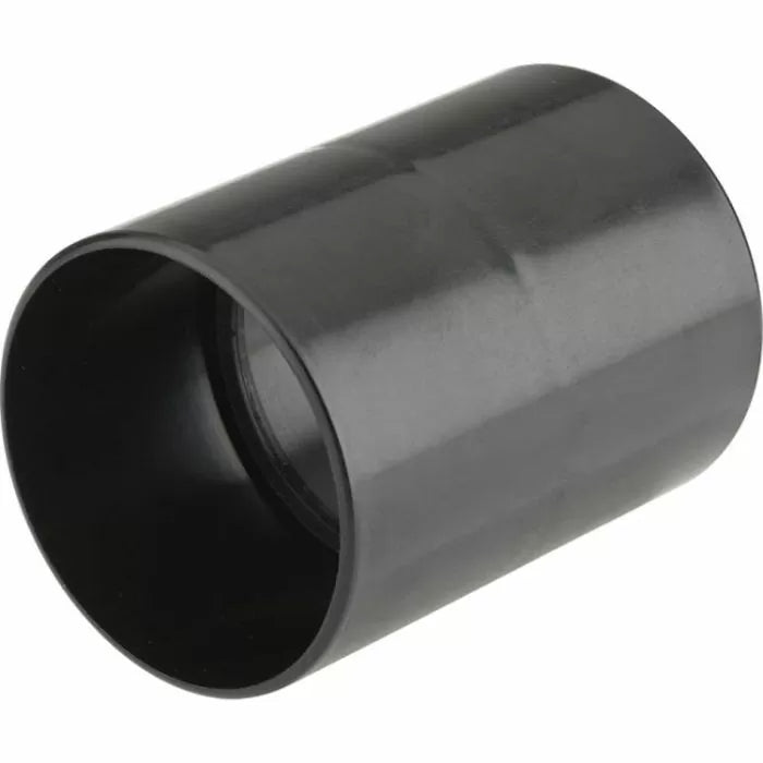 Black plastic dust collection hose connector for woodworking tool setup