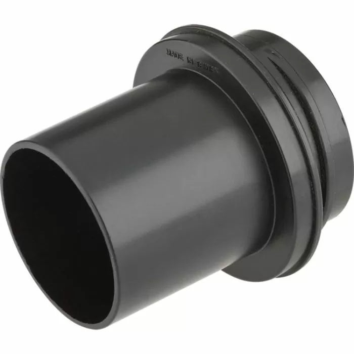 Black plastic router table dust port adapter for woodworking dust collection.