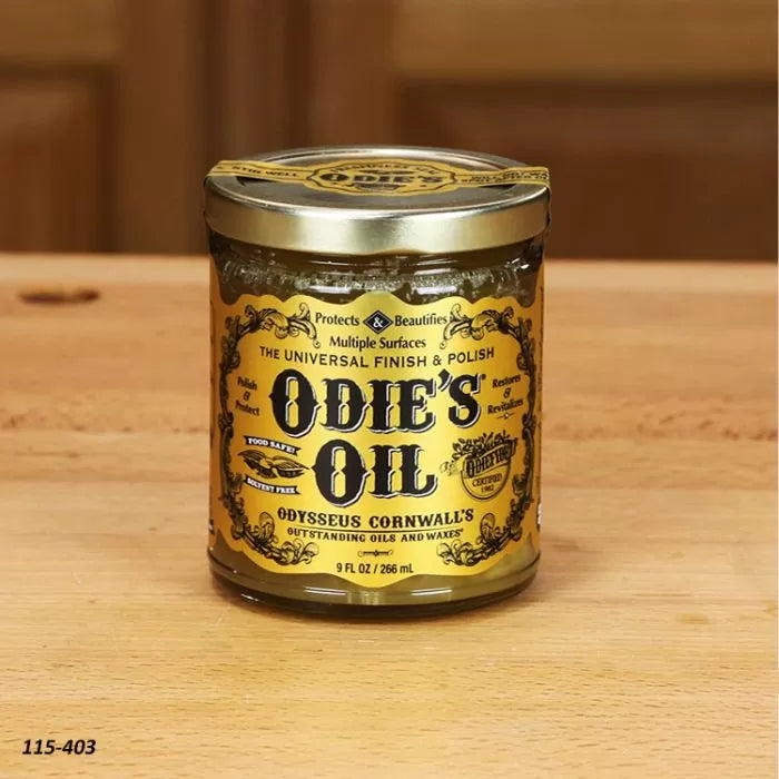 Odie's Oil wood finish jar on a wooden surface, ideal for woodworking and surface protection