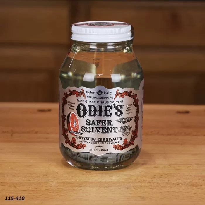 Odie's Safer Solvent jar for woodworking on a wooden table