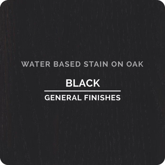 Black water-based wood stain sample on oak with visible grain texture