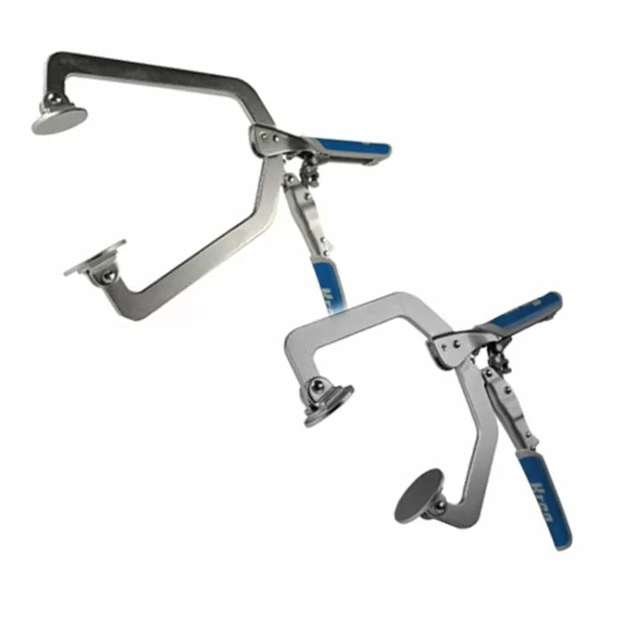 Metal woodworking clamps with blue handles and adjustable pads on a white background