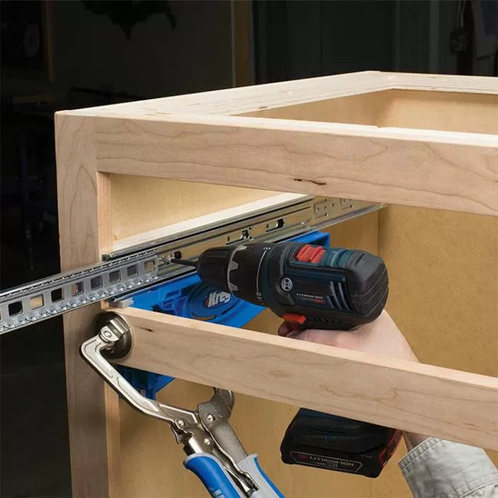 Installing cabinet drawer slides with a power drill and woodworking jig