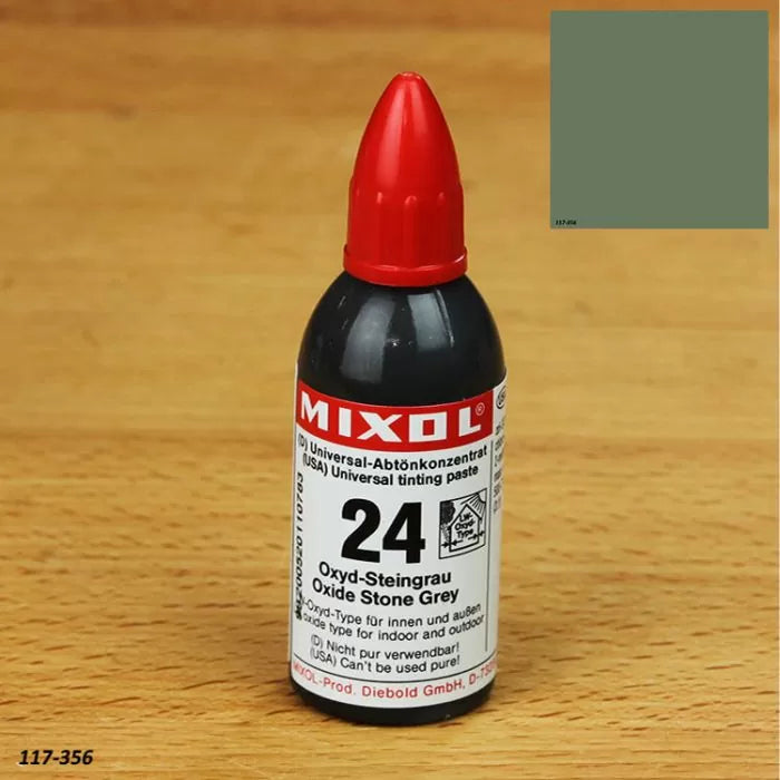 Mixol oxide stone grey tinting paste bottle with red cap on wood surface, color swatch inset