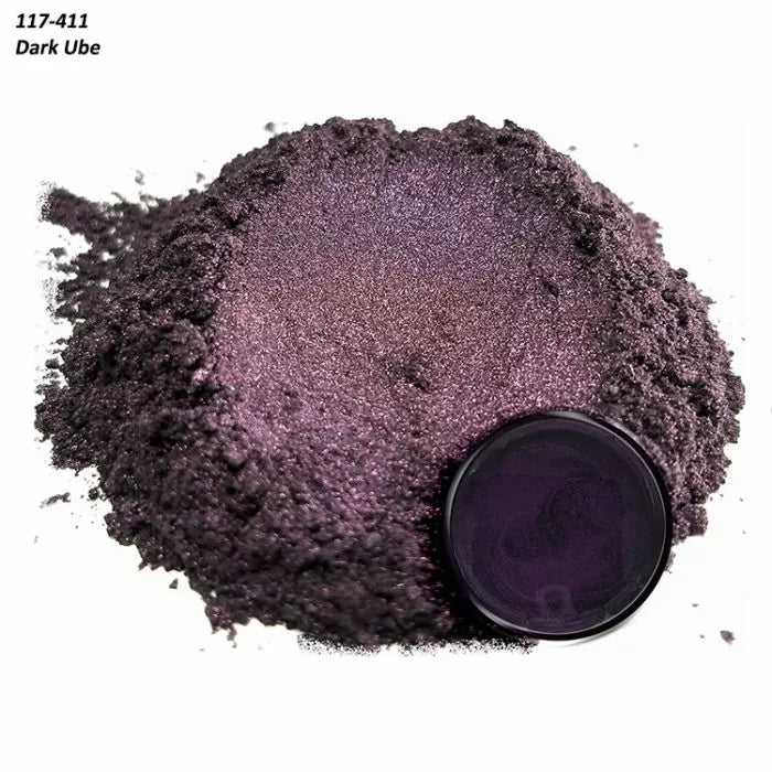 Pile of dark purple metallic powder pigment labeled Dark Ube, with a close-up container.