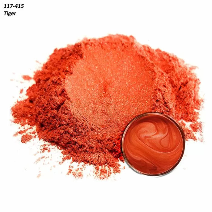 Orange metallic pigment powder with mixed resin sample for woodworking projects