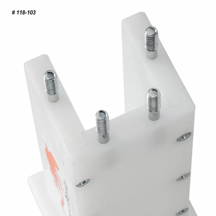 Close-up of woodworking jig with four metal bolts, ideal for precise joinery tasks