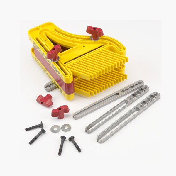 Yellow woodworking featherboards with metal mounting hardware for router tables and saws