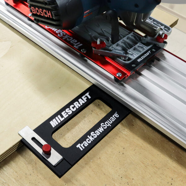 Milescraft TrackSawSquare guide with Bosch saw on track, cutting plywood for woodworking