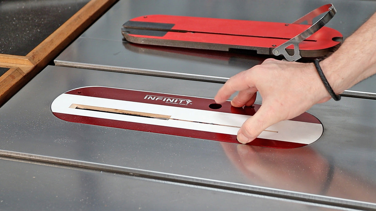 Hand adjusting saw table zero clearance insert for woodworking with Infinity Cutting Tools marking