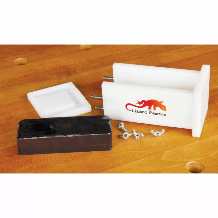 Lizard Blanks white resin mold kit with hardware and resin block on woodworking bench