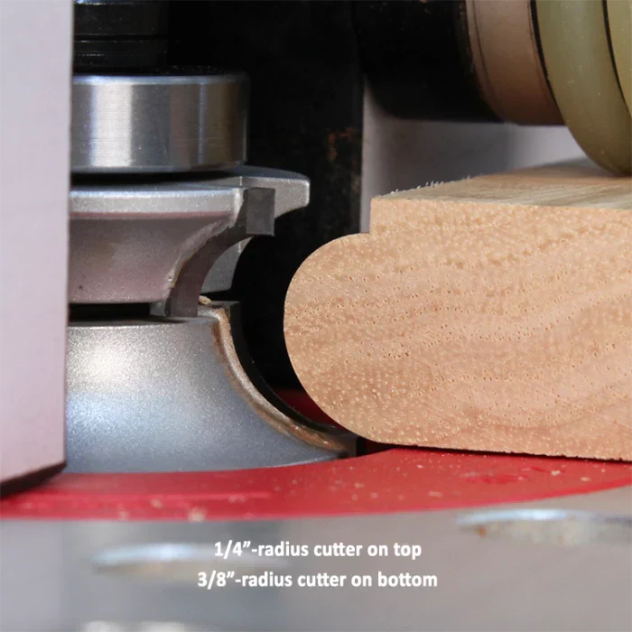 Router table with radius cutter shaping wooden board, woodwork edge profiling in progress