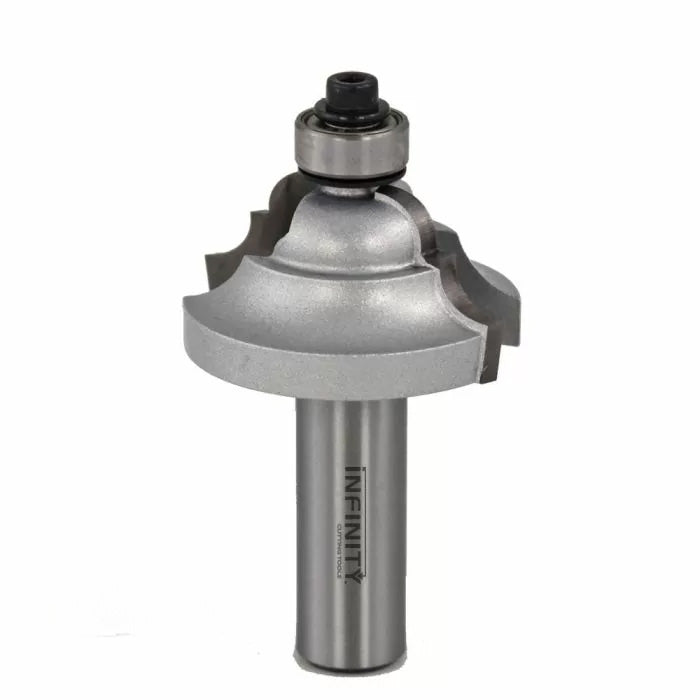 Large silver ogee router bit with bearing for woodworking, isolated on white background.