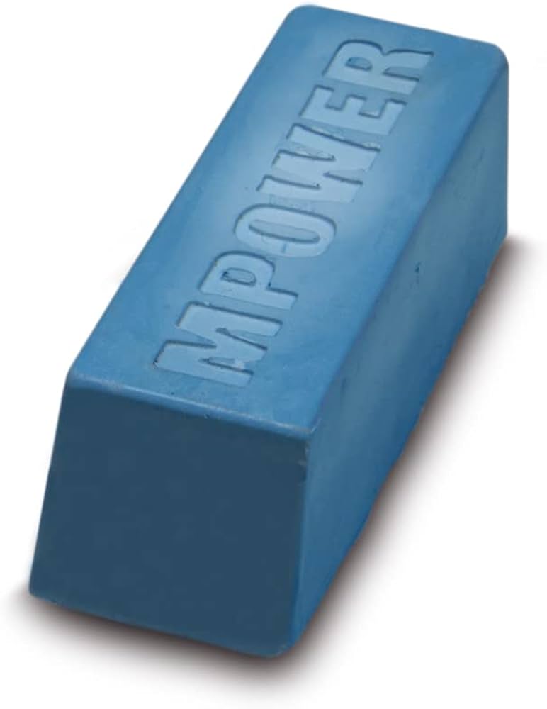 Blue honing compound block for sharpening woodworking tools, embossed with MPOWER text.