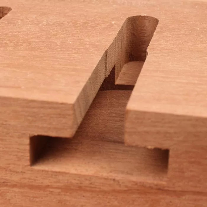 Close-up of a dado and rabbet joint cut in wood for woodworking projects