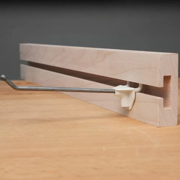 Wooden router table fence with T-track and metal adjustment bar for woodworking precision