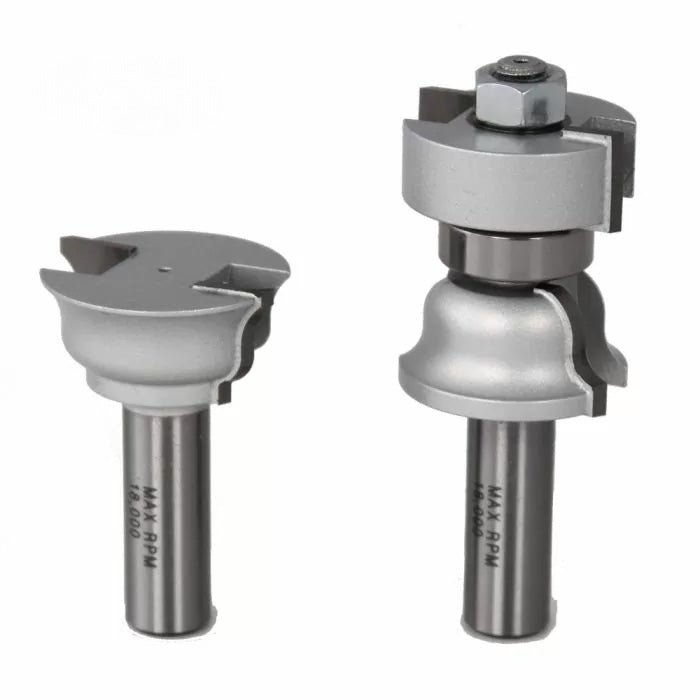Set of two steel woodworking router bits with decorative profiles on white background