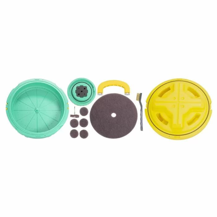 Woodworking blade cleaning kit with yellow and green plastic parts, scrub pads, handle, and brush
