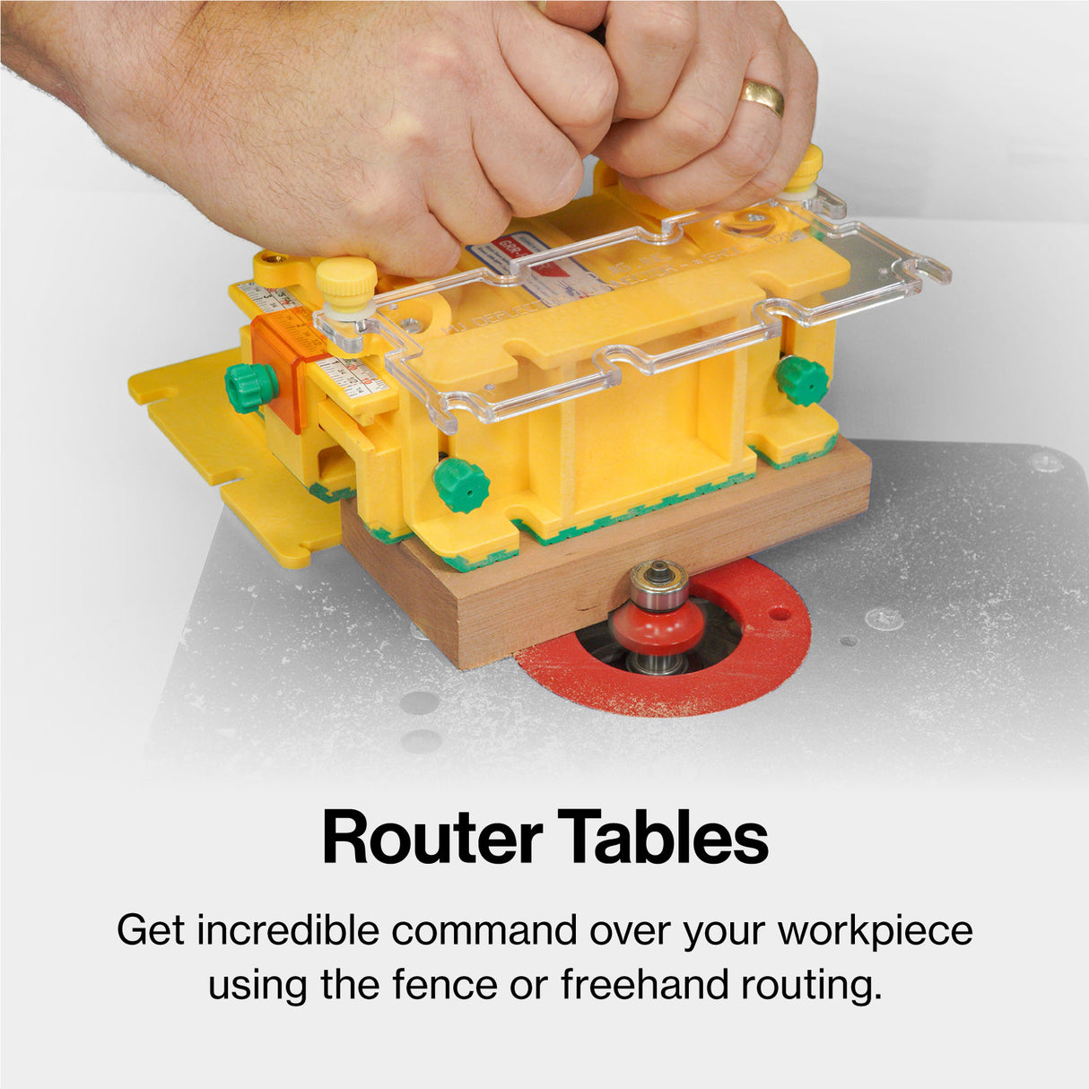 Hands using a router table with a yellow router jig and wood piece for precision woodworking.