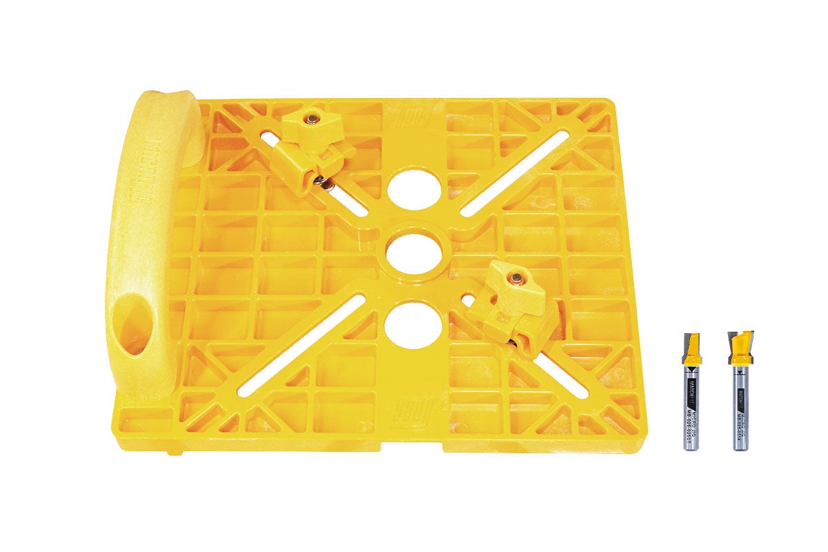 Yellow plastic router guide with adjustable clamps and two straight router bits on white background