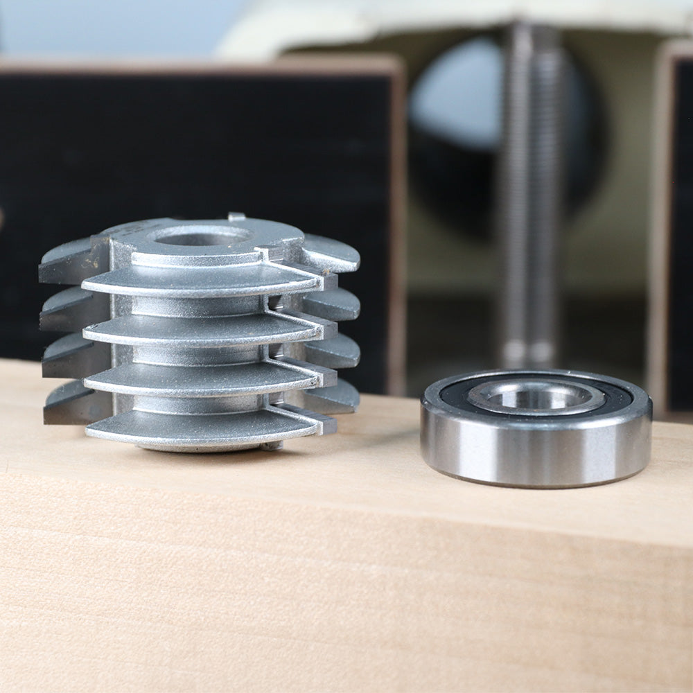 Stacked dado blades and a bearing for woodworking on a wooden surface