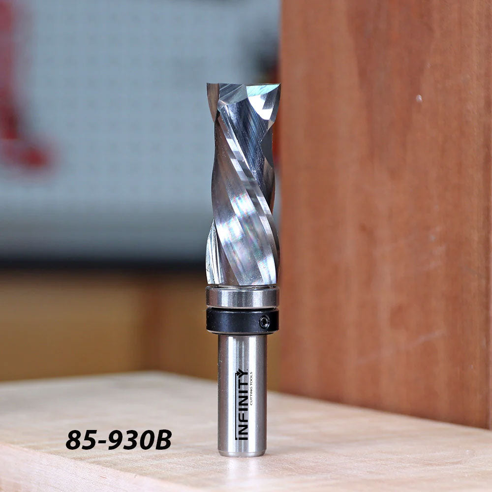 Spiral upcut router bit for woodworking, labeled 85-930B, on a wooden surface