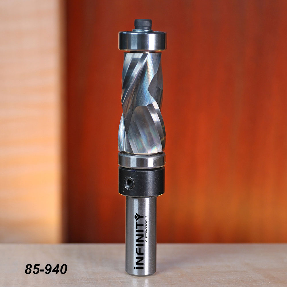 Spiral flush trim router bit with bearings, shown upright on a wooden surface, model 85-940.