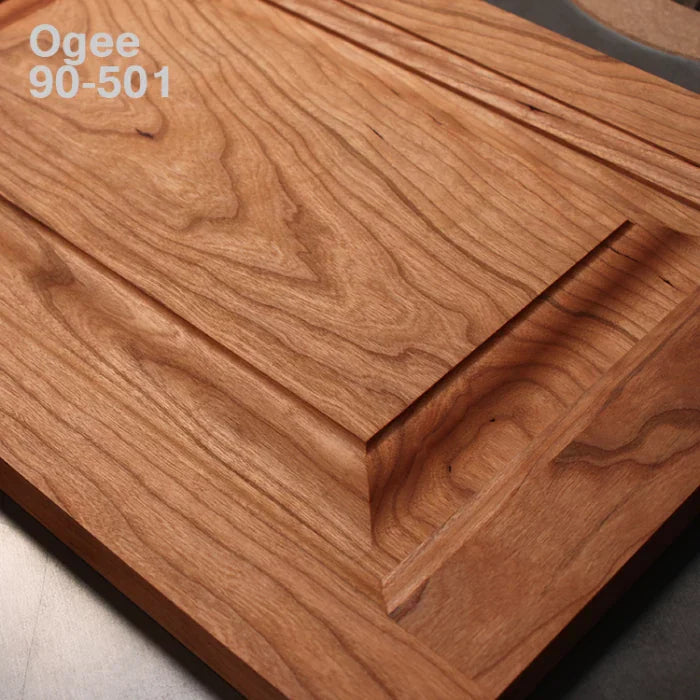 Ogee profile cabinet door edge with smooth hardwood grain and detailed woodworking