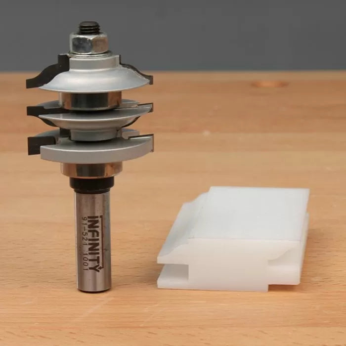 Rail and stile router bit with sample profile on a wooden workbench