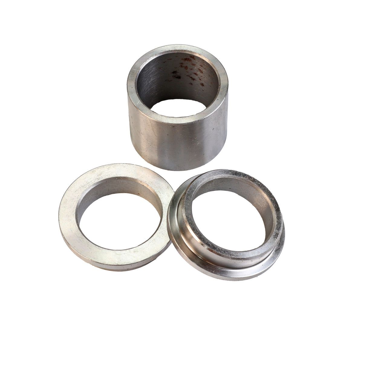 Three metal bushings for woodworking tools on a white background