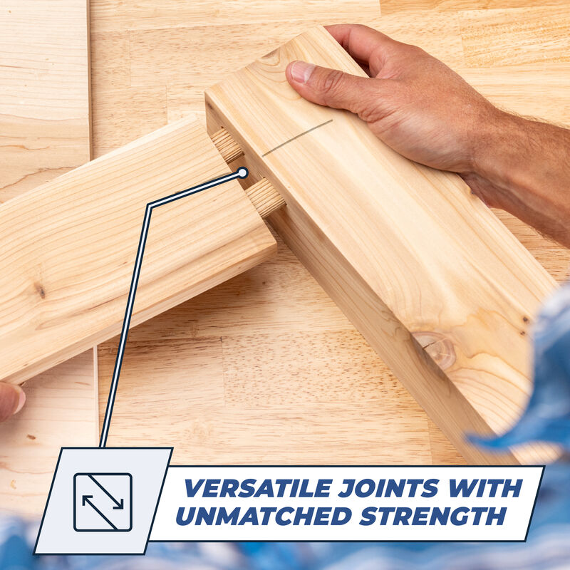 Hands joining two wooden boards using dowel joints on a woodworking table