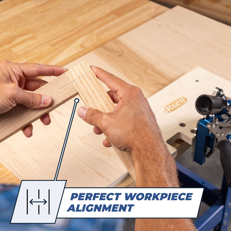Hands aligning wooden pieces on woodworking jig for precise joinery