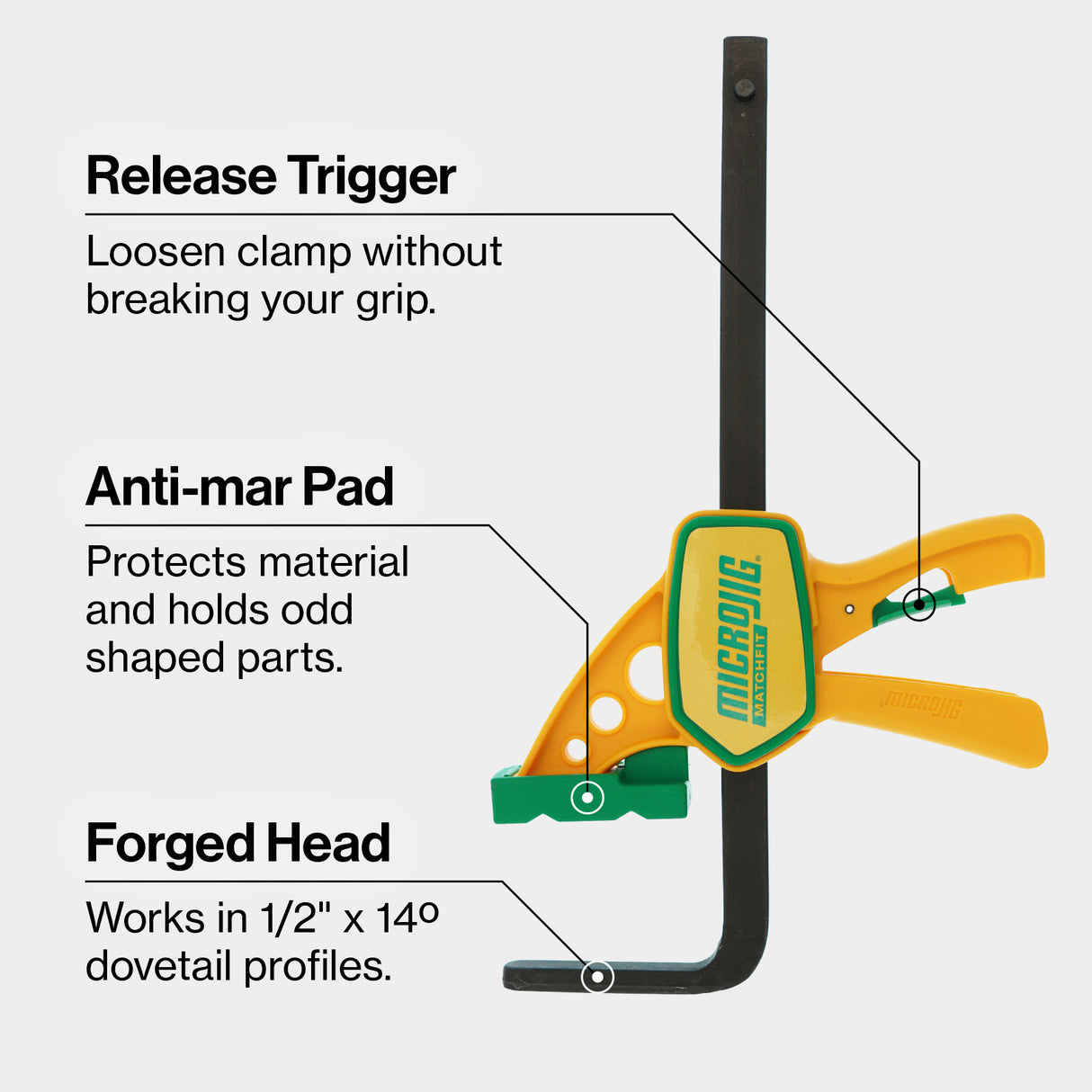 Dovetail track clamp with release trigger, anti-mar pad, and forged head for woodworking