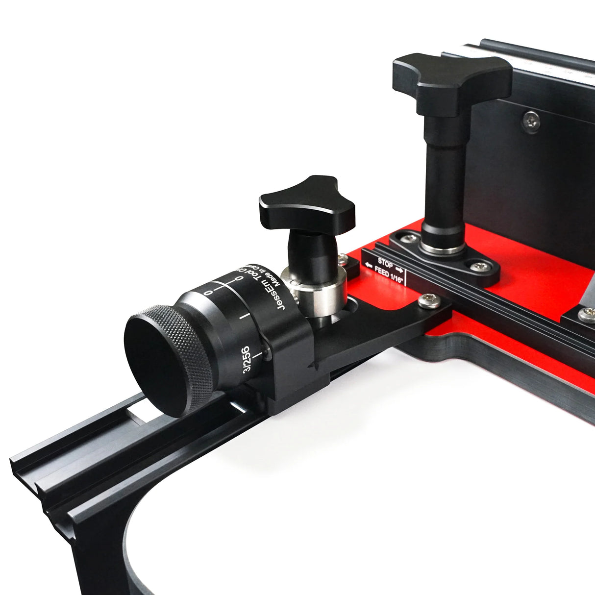 Close-up of micro adjuster tool for woodworking router table, precision dial and lock knobs visible.