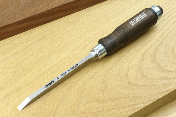 Wood chisel with Narex branding on a wooden surface