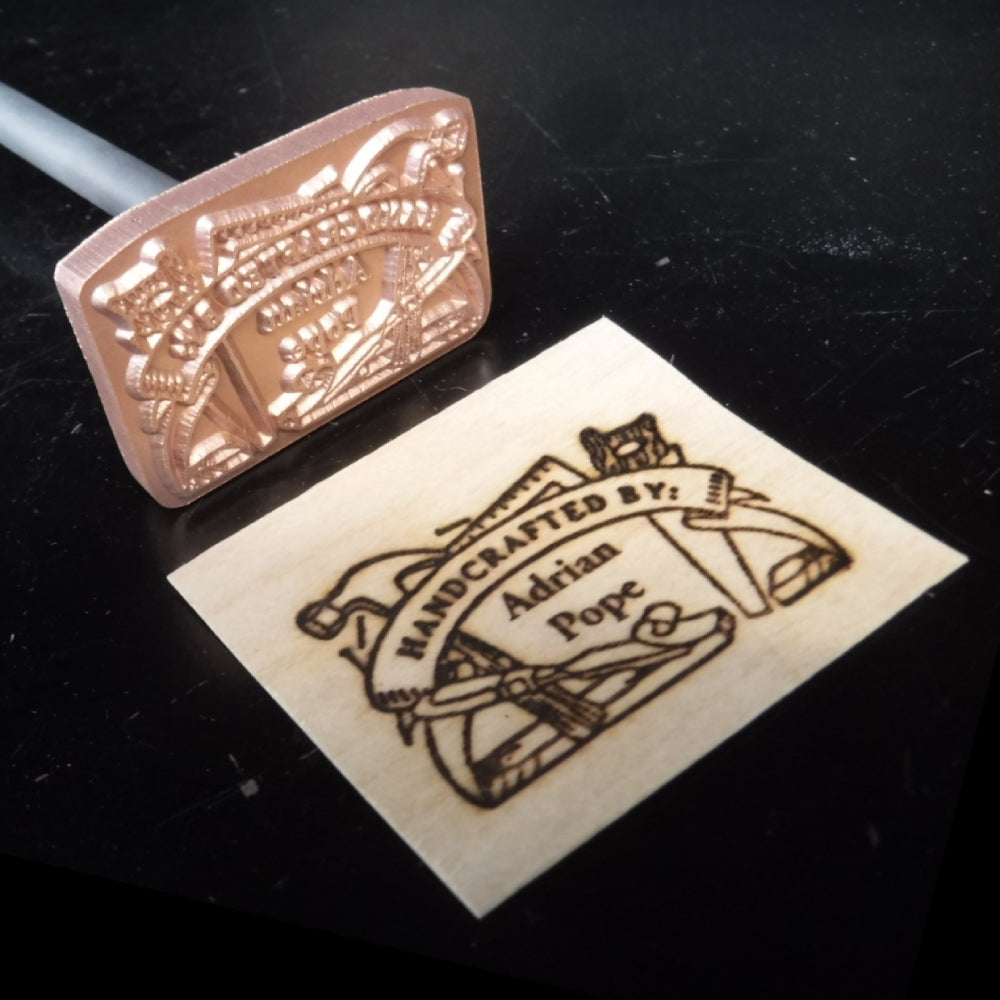 Custom metal branding iron and branded wood tag for handcrafted woodworking projects