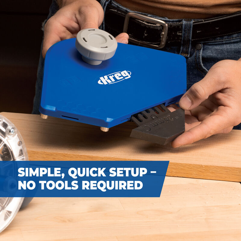 Woodworker setting up blue Kreg router table tool with simple, quick, no-tool adjustment