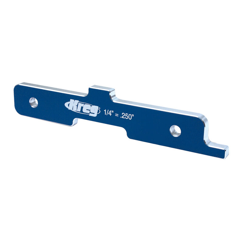 Blue aluminum router table setup gauge with engraved measurement markings for woodworking
