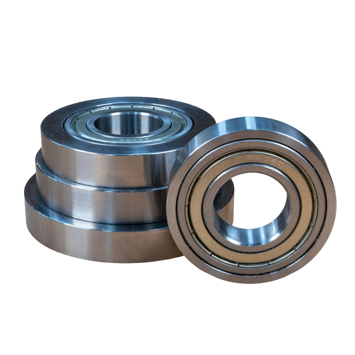 Stack of metal rub collars for woodworking router bits on white background